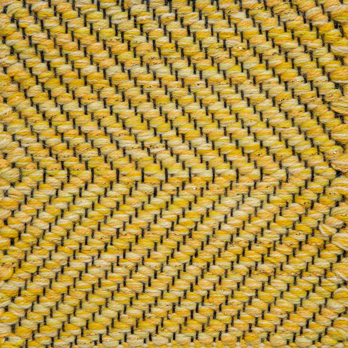 <p>Carpathian Metallic Twisted Herringbone, yellow mix 2001, 2002, 2004, 2005, 2006, 2008, 2008 with Gold lurex effect on the black yarn</p>