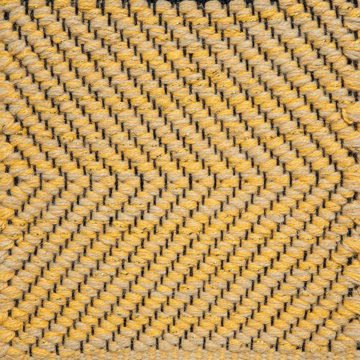<p>Carpathian Metallic Twisted Herringbone, yellow mix 2003, 2008, 6003, 2008 with Gold lurex effect on the black yarn</p>