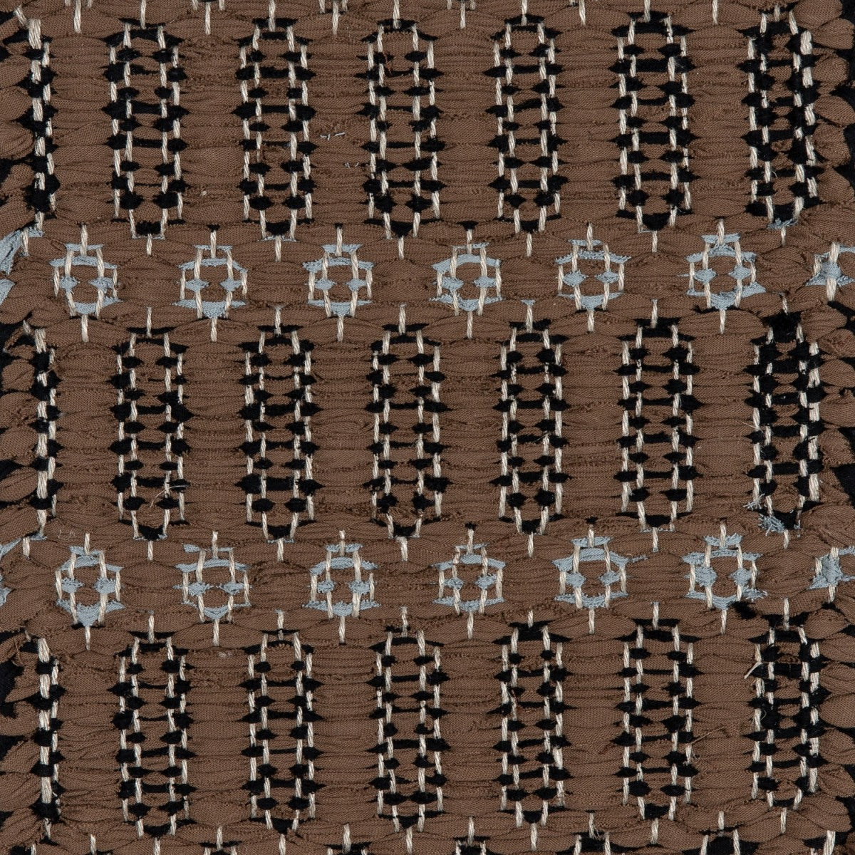 <p>Columns Double-Coloured, main brown 241, inside columns black 166, inside rosepath light blue 126 on the natural yarn</p>