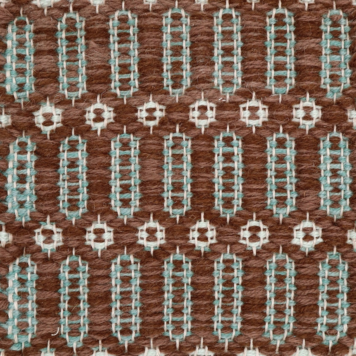 <p>Columns Double-Coloured, main brown mix 6017, CH4225, inside columns juniper 8200, 8235, inside rosepath light green 8216 on the natural yarn</p>