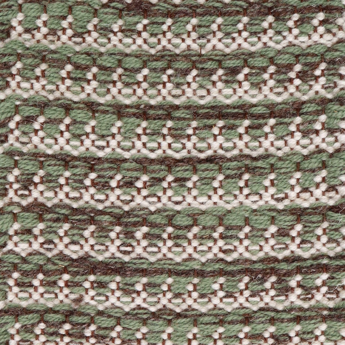 <p>Dog Tooth, main green mix 17, 1025, inside white mix CH1207, 1023 on the dark brown yarn</p>