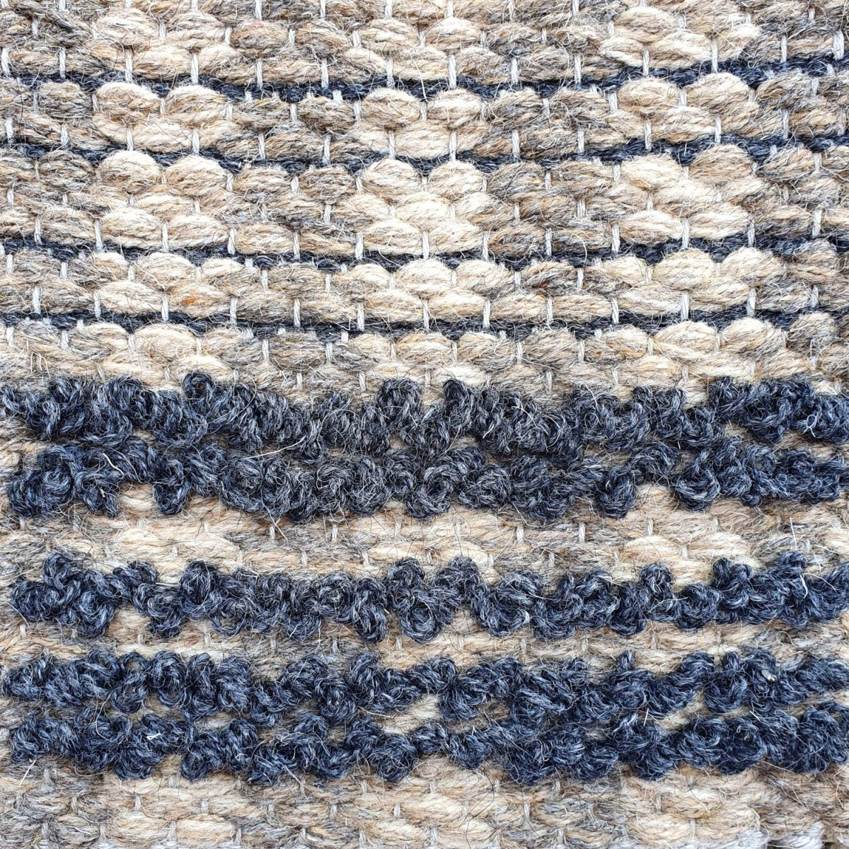 <p>Double Weave and Bouclé, light beige mix 02, 03, dark beige mix 11, 02, bouclé in dark grey 05 on the natural yarn</p>