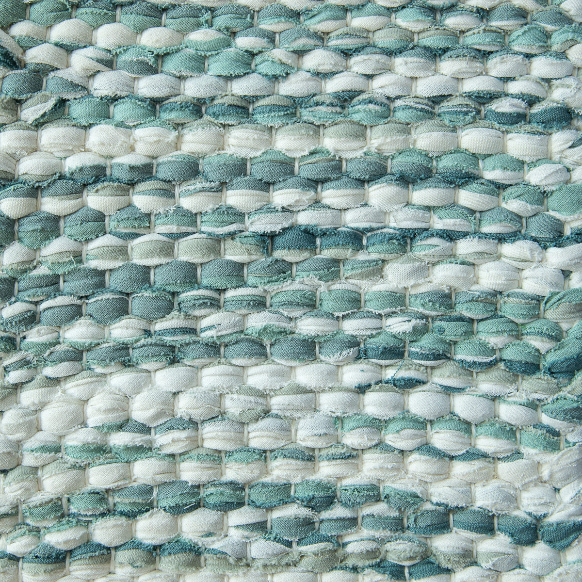 <p>Double Weave, white mix 101, 102, effects 405, 433, 469 on white yarn</p>