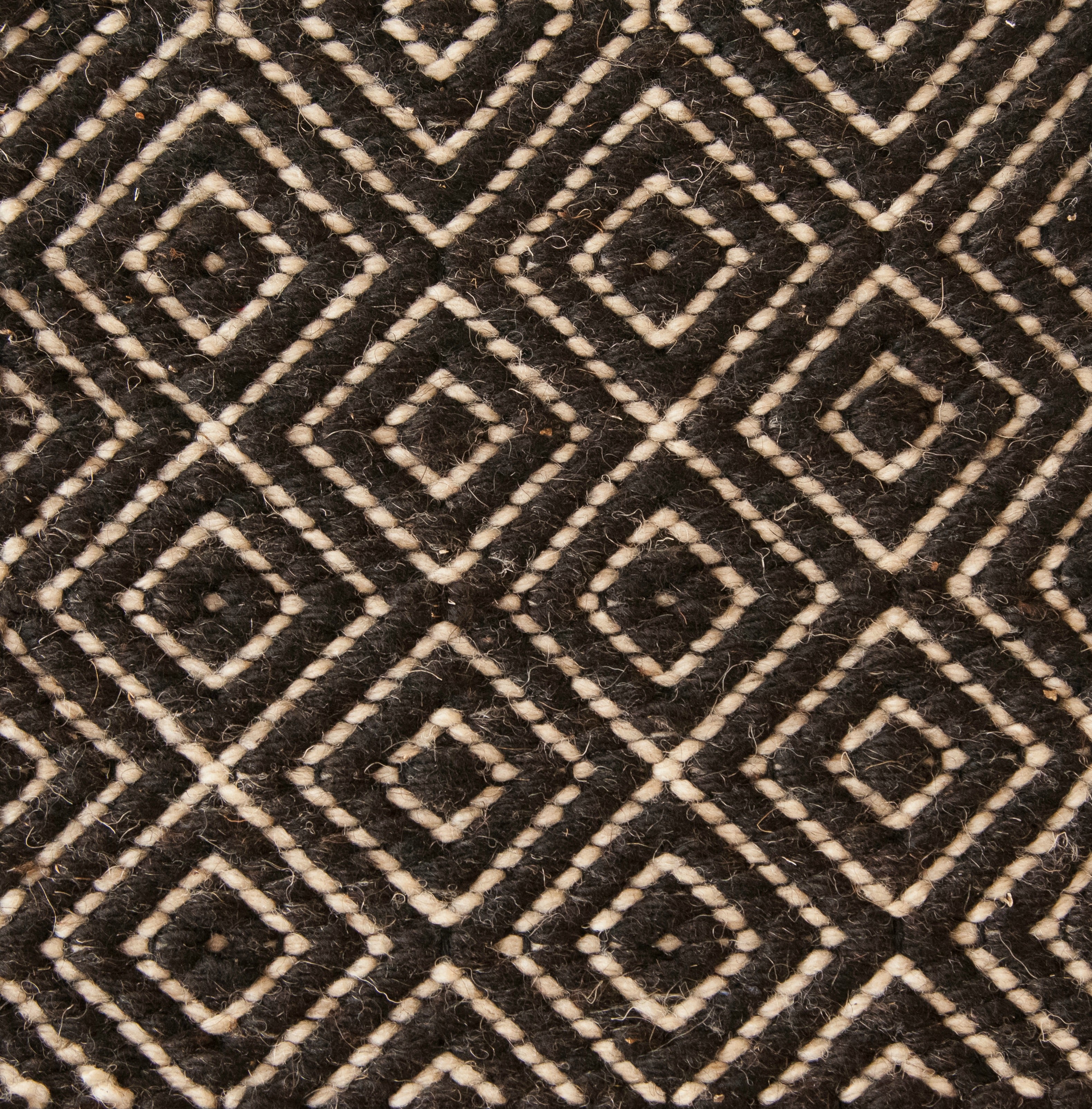 <p>Dual Diamond Twill, main black 1006, inside beige 07 on the black yarn</p>
