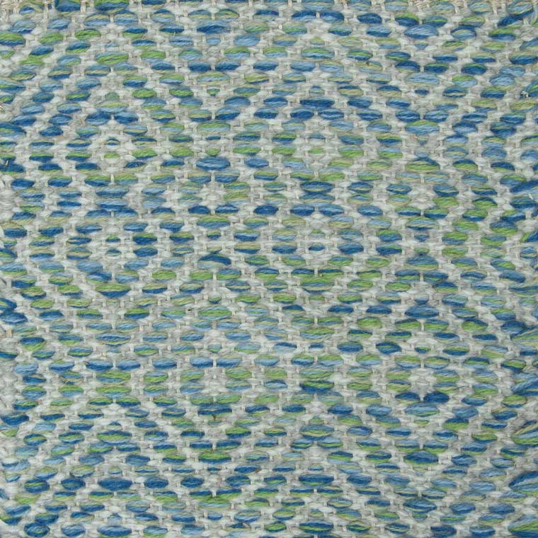 <p>Dual Diamond Twill in different sizes, main blue-green mix 5010, 5013, 5021, 4004, 4015, inside grey mix 1023, 1009 on the natural yarn</p>