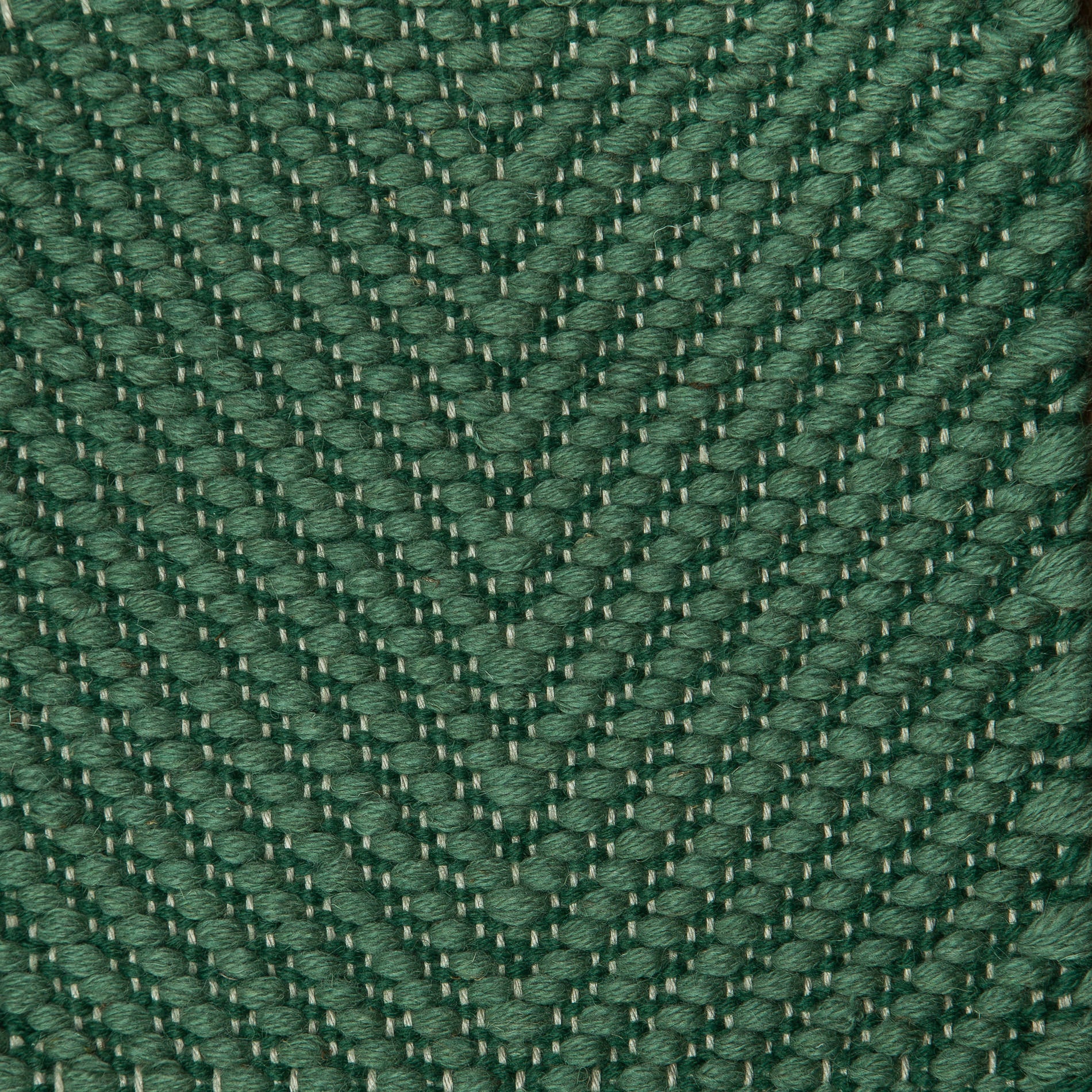 <p>Dual Vertical Herringbone, main green 4006, inside dark green 4007 on the natural yarn</p>