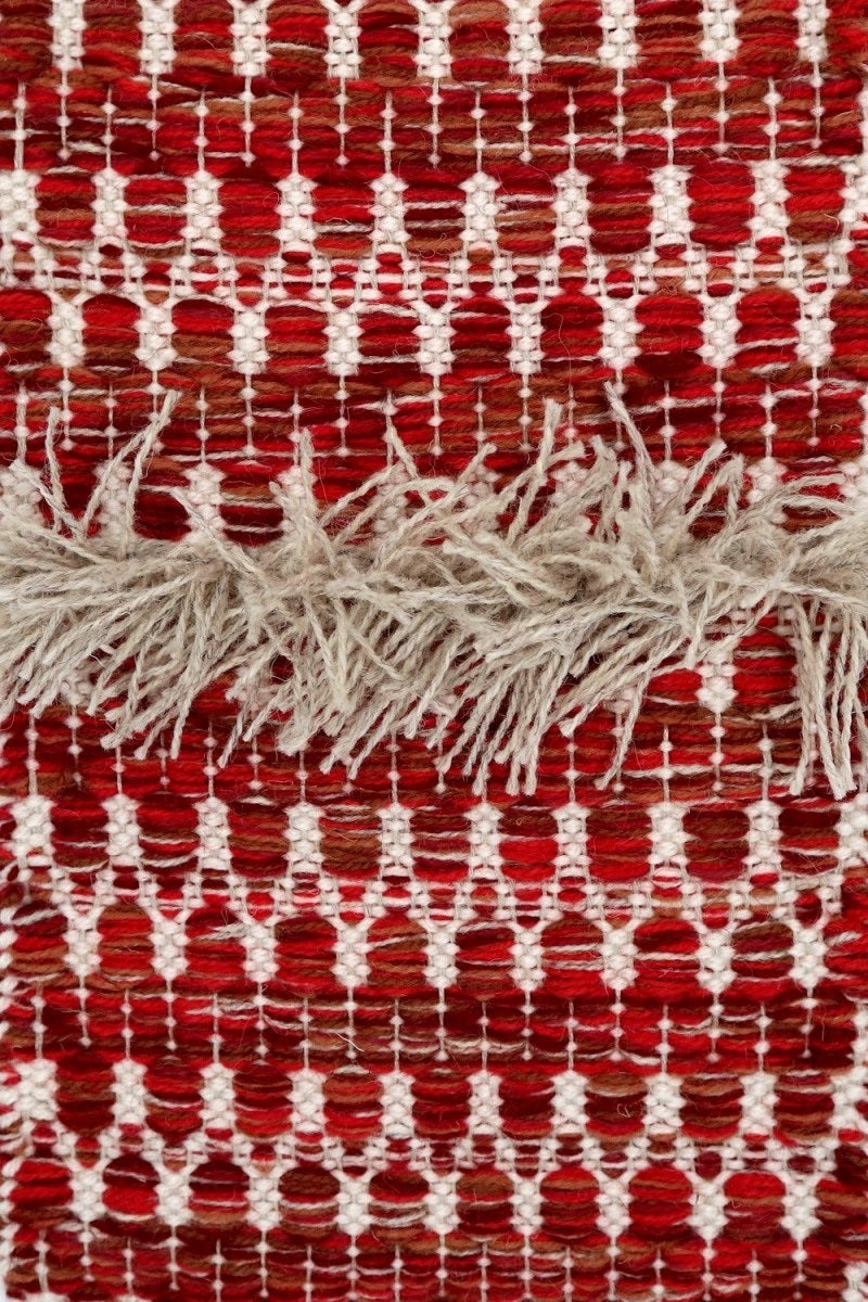 <p>Folk Zig Zag with Rya, main red mix 6037, 6008, 6002, 3011, 3015, 3006, 3008, 12, inside white CH044, rya light grey 12 on the natural</p>