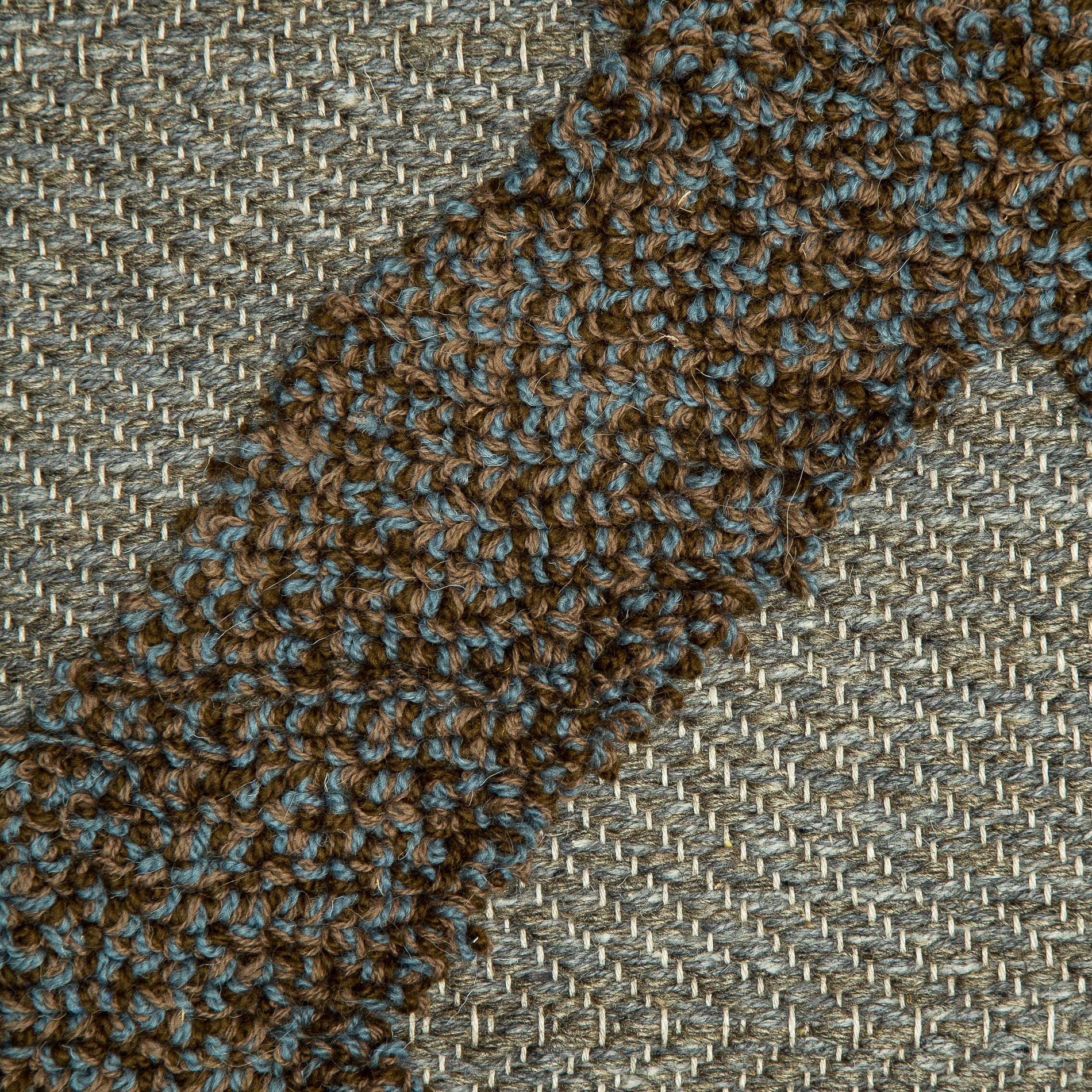 <p>Carpathian Tufted Herringbone (25sm turns), base grey mix 04, 08, 11, Boucle in brown mix 6017, CH4225, CH3424 on the natural yarn (12)</p>