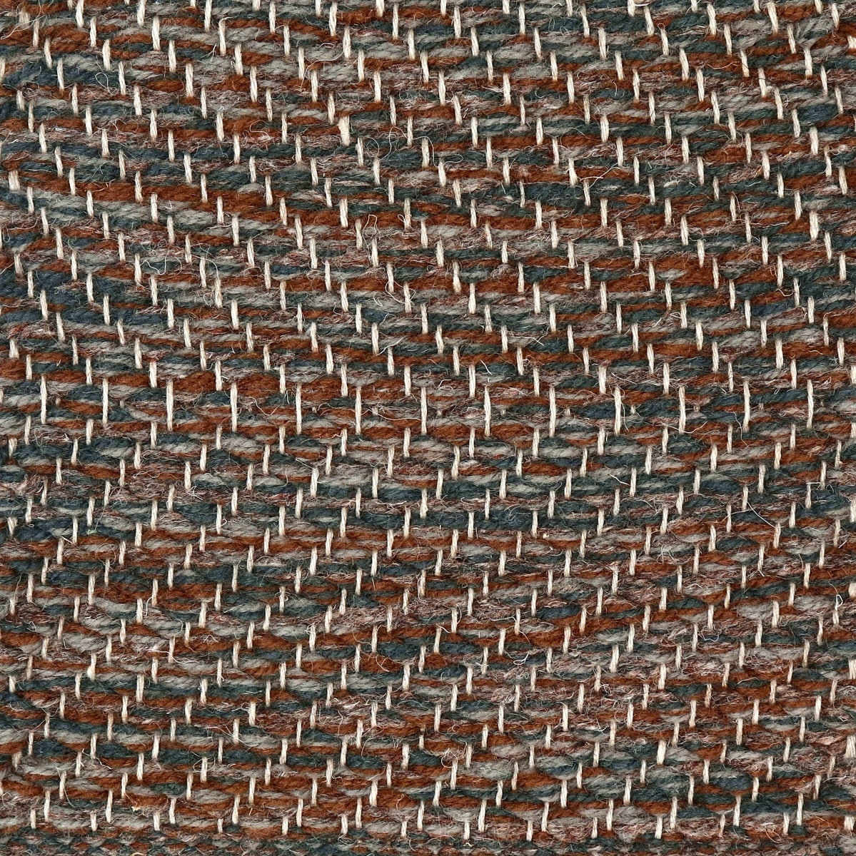 <p>Herringbone, dark blue brown mix 17, 1007, 6020, 8132 on the natural yarn</p>