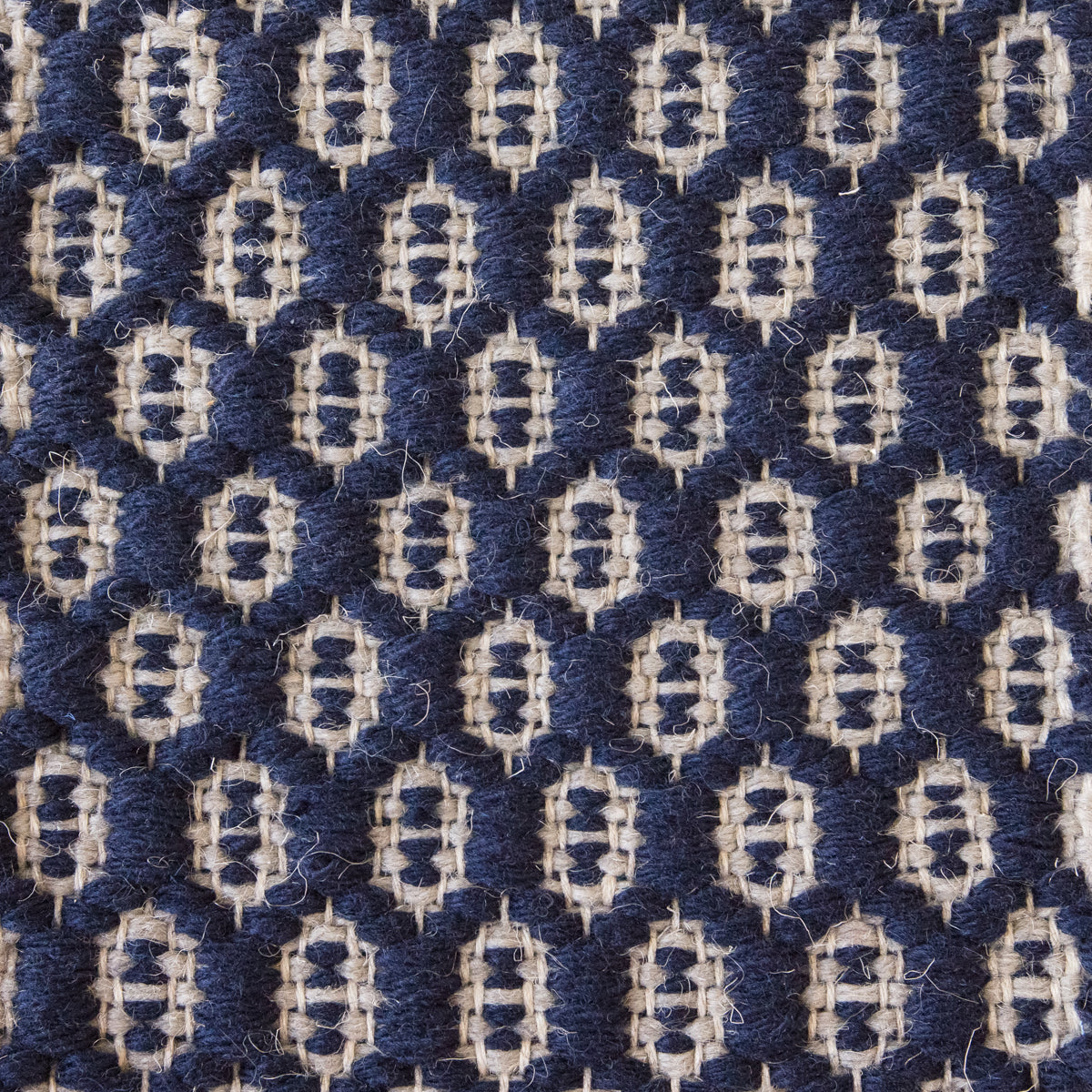 <p>Honeycombs, main blue 5027, inside light grey 1002 on the natural yarn</p>