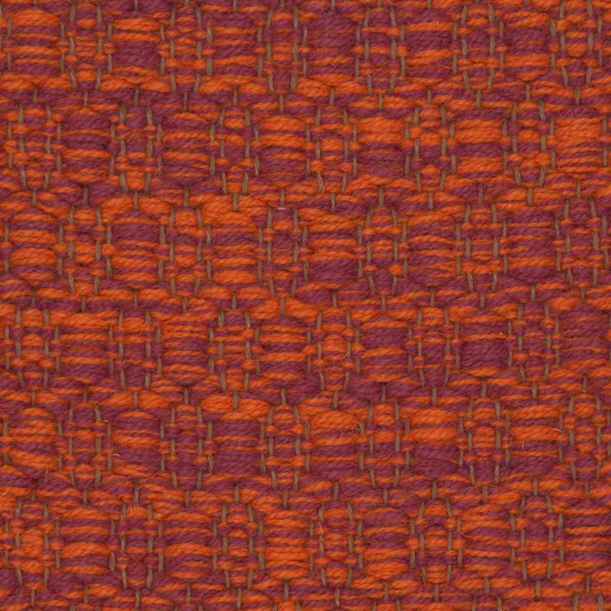 <p>Honeycombs, mix of orange CH055, burgundy - 6037 on the brown yarn</p>