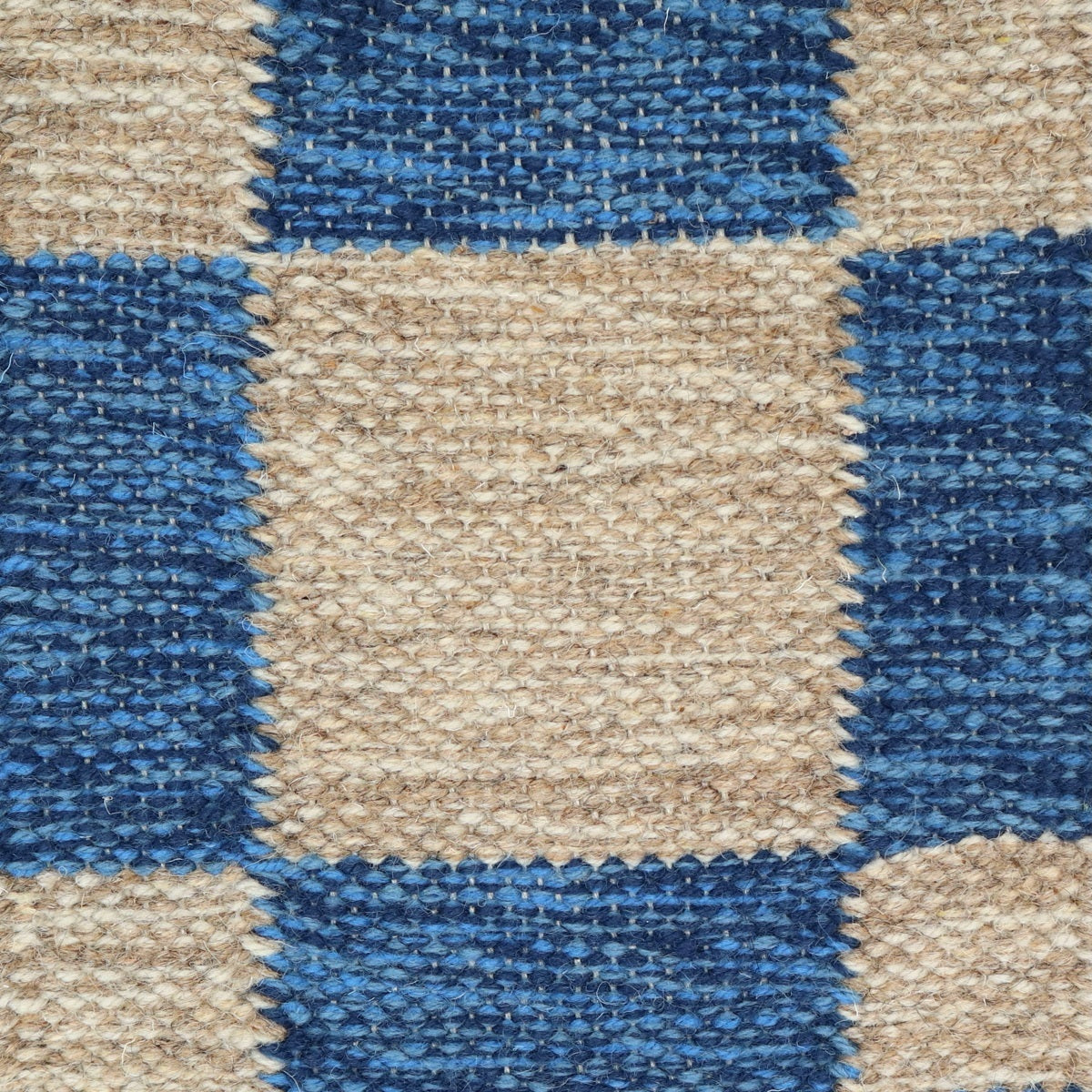 <p>Single Weave Chequered, sq 1 - blue mix 5027, 5021, 5013, sq 2 - cream mix CH1207, 03, 02 on the natural yarn</p>