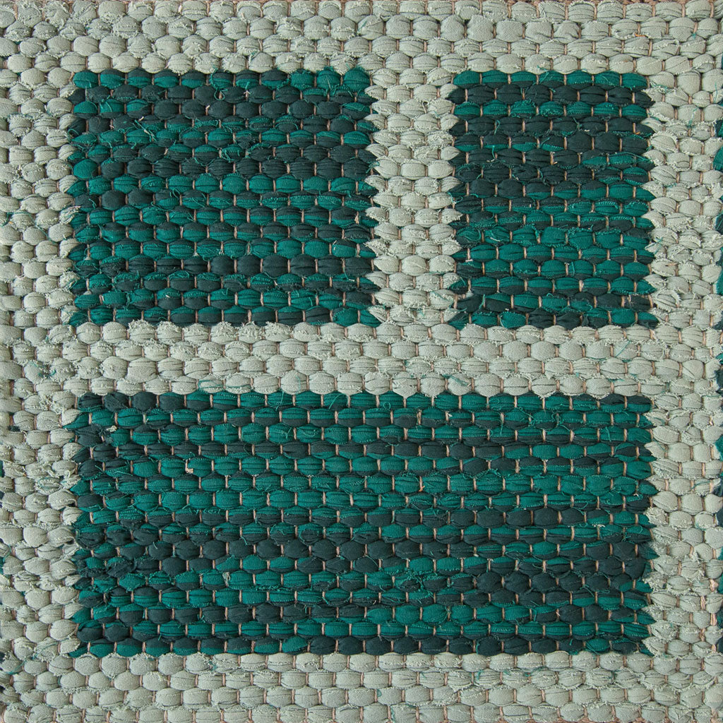 <p>Double Weave CORNICI, squares green mix 480, 480/1, frame light green 471, 406 on the natural yarn</p>