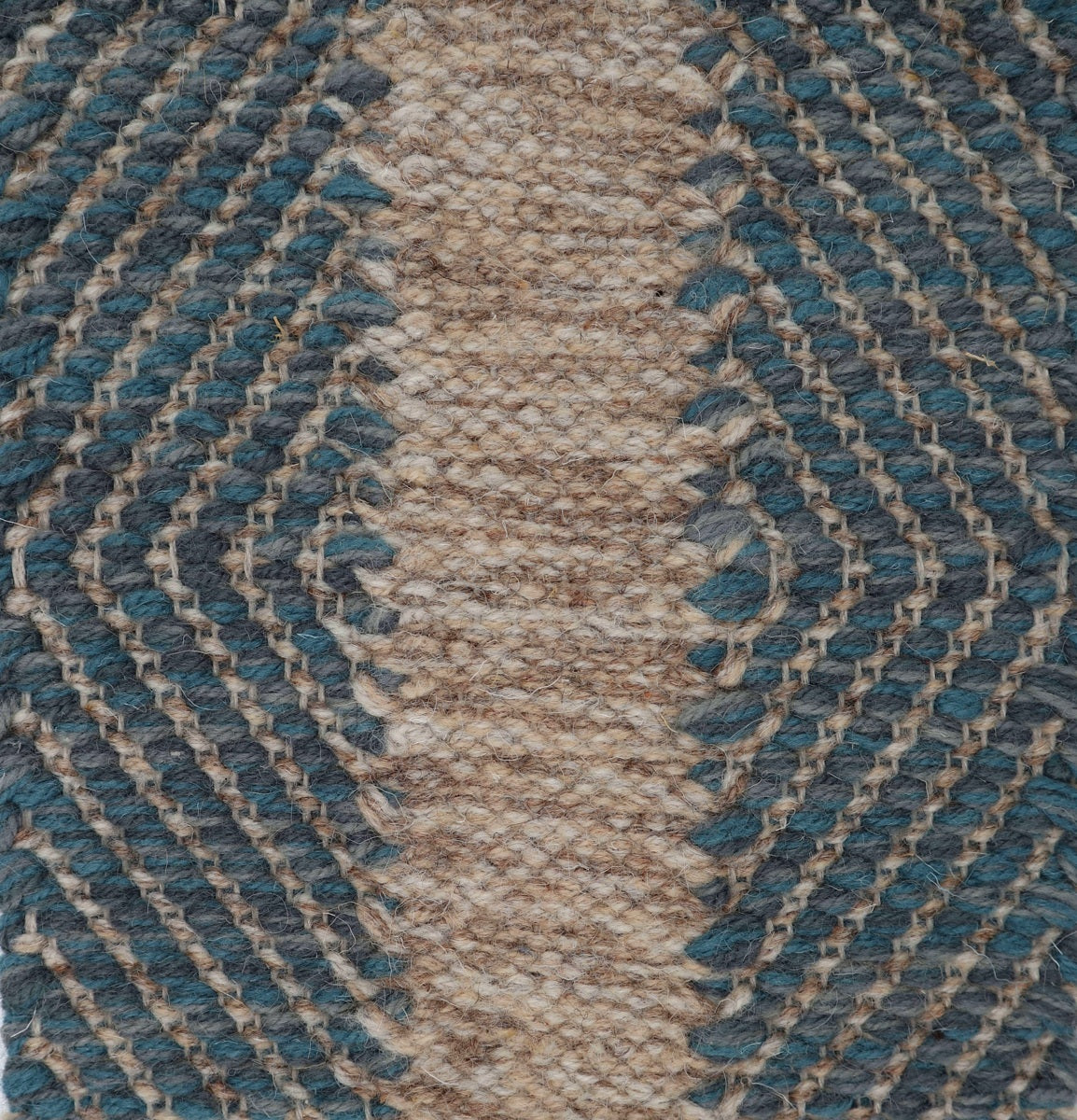 <p>Milano Panels, Vertical Stripes in Big Dual Diamond Twill, main blue mix 062, 262, 8015, 8008, 8053, 8052, base beige mix 02, 03, 12 on the natural yarn</p>