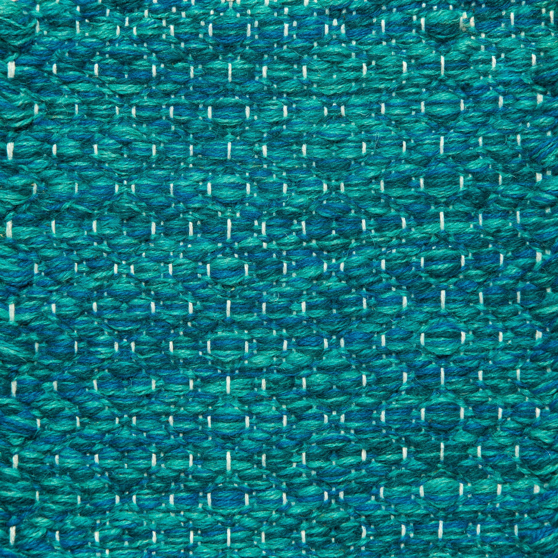 <p>Round Diamond Twill, blue mix 5005, 5006, 5007, 5008 on the white yarn</p>