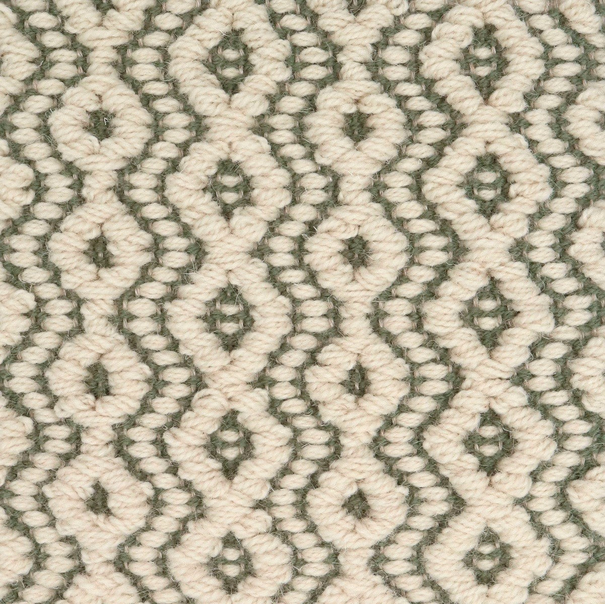 <p>Round Diamond Twill in Bouclé, main bouclé in cream 06, inside green 1025 on the natural yarn</p>