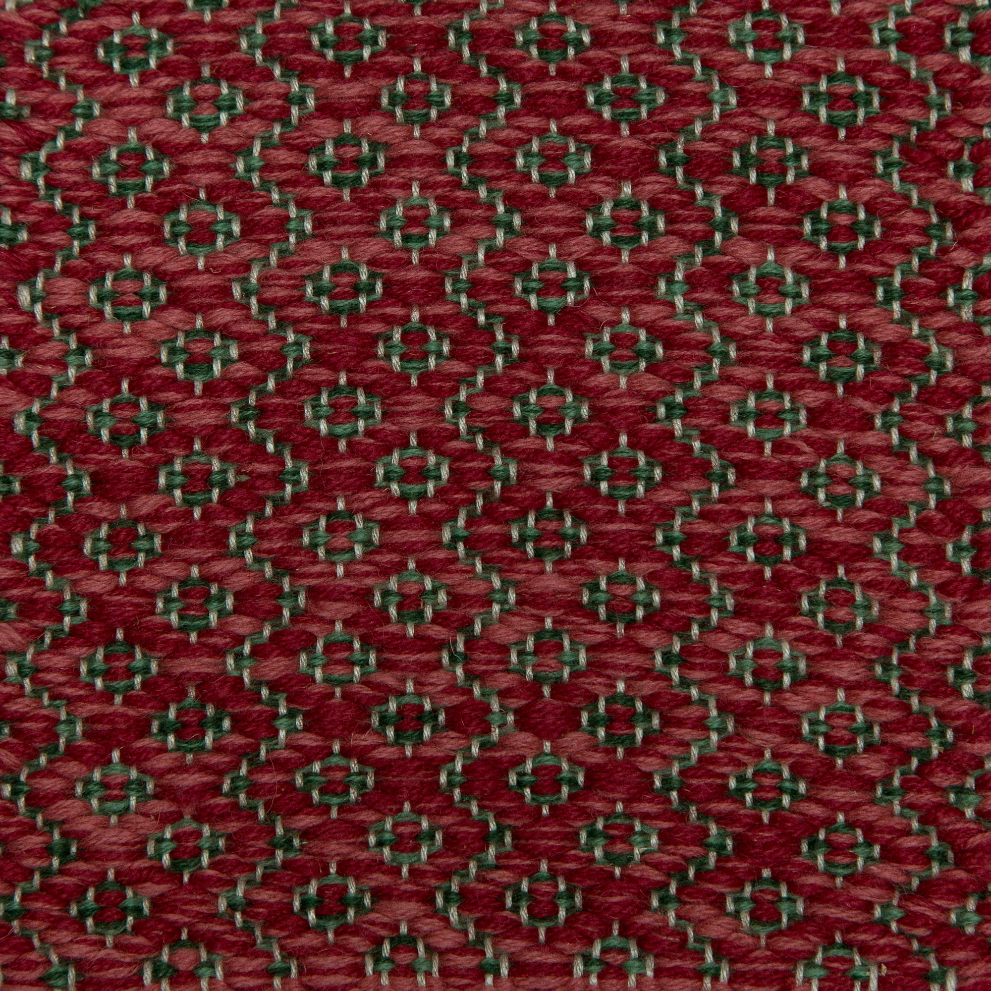 <p>Round Rosepath pos./neg., main red mix 3010, 3011, inside green mix 4006, 4011 on the natural yarn</p>