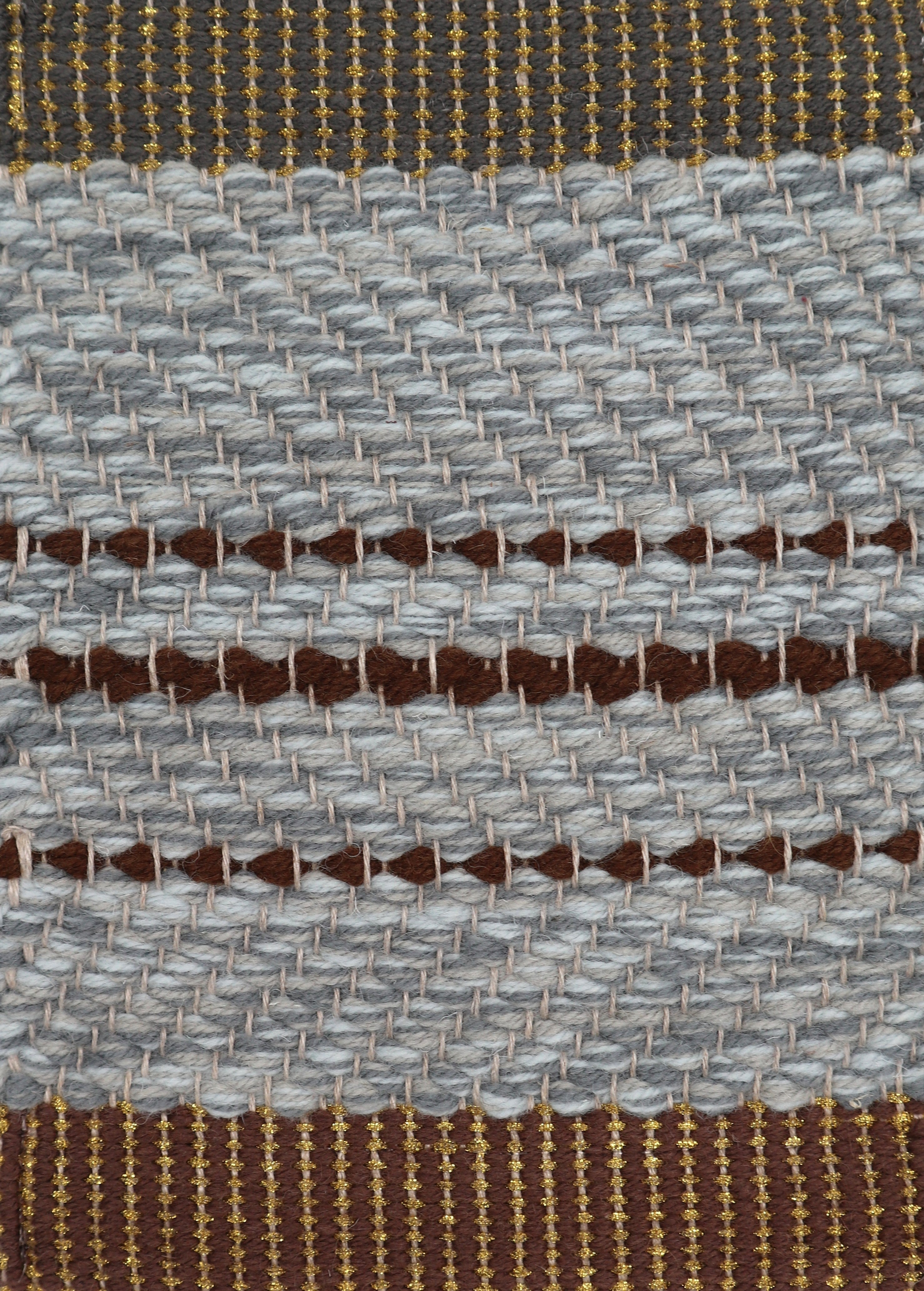 <p>SNOW&amp;COAL by Lars Nilsson, grey mix 1009, CH054, 8052, stripes in brown CH4225, woven striped endings 1) 6005 with gold ribbon 2) 1005 with gold ribbon, warp - natural linen</p>