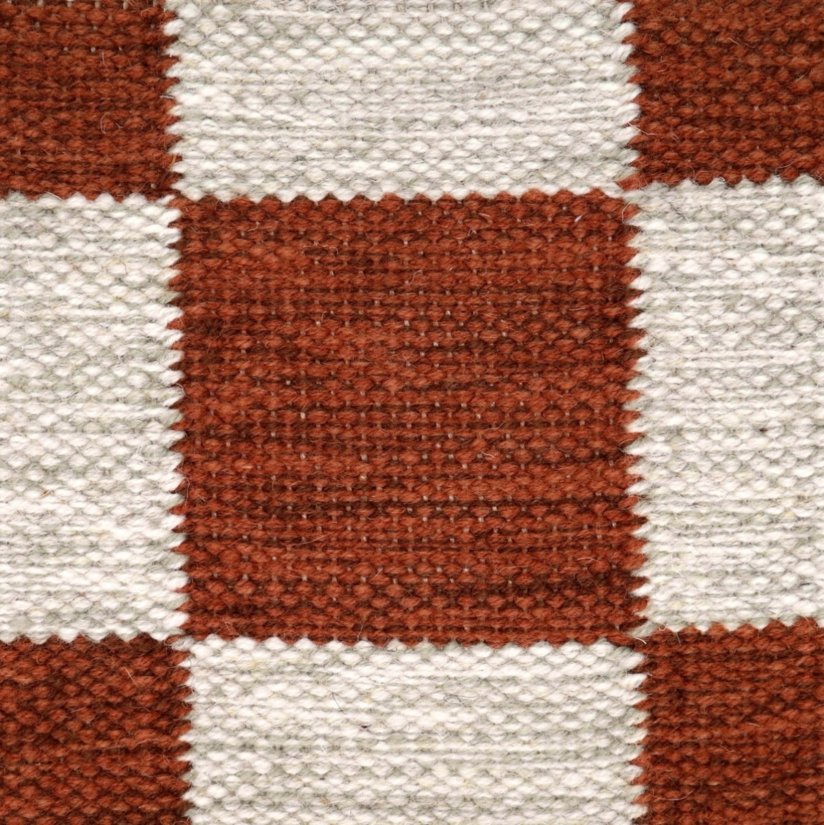 <p>Single Weave Chequered, 1 sq brown mix 6002, 6008, 8132, 2 sq light grey mix 12, 10111023, CH044 on the natural yarn</p>