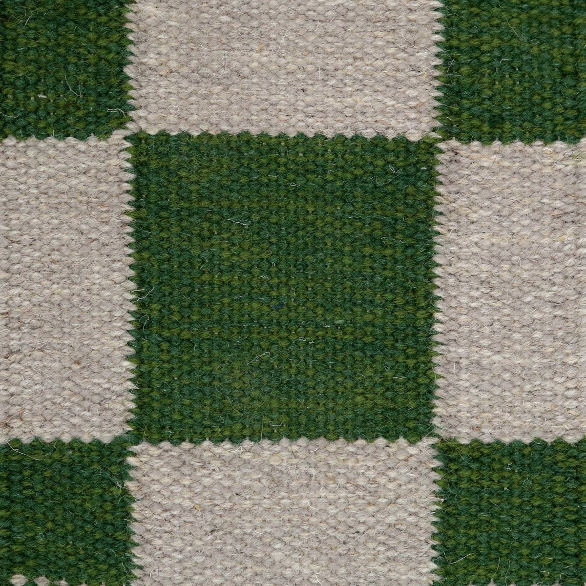 <p>Single Weave Chequered, 1 sq - green mix CH017, CH015, 2 sq - grey mix 12, 1011 on the natural yarn</p>