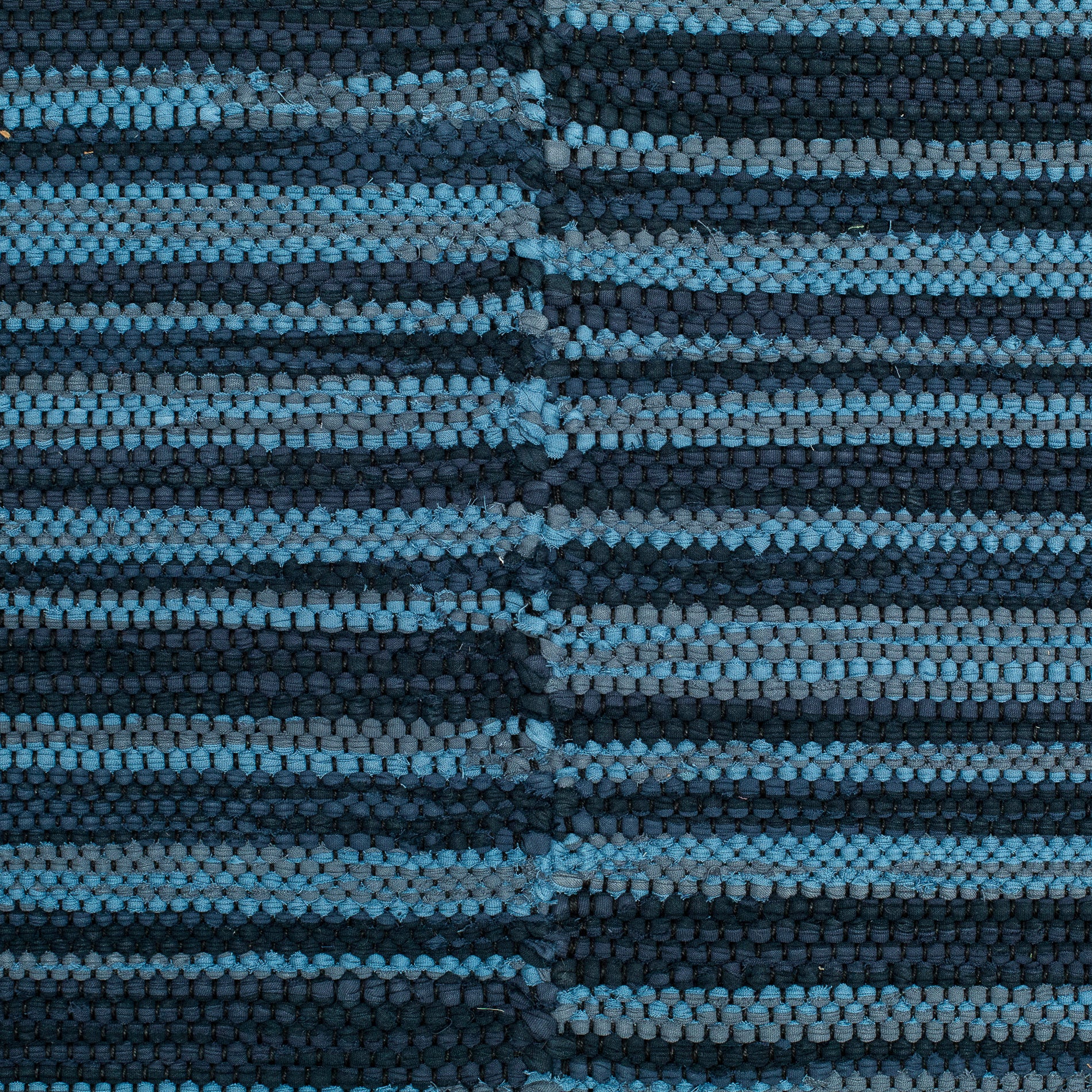 <p>Single Weave Striped, Stitched Together, 1 stripe dark blue mix 534, 170, 2 stripe blue mix 157, 169 on the black yarn</p>