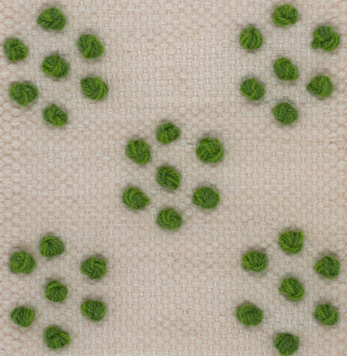 <p>Single Weave with Pearls in Bespoke Flower Formation, base in white CH044, Pearls in green mix 4003, 4004 on the white yarn</p>