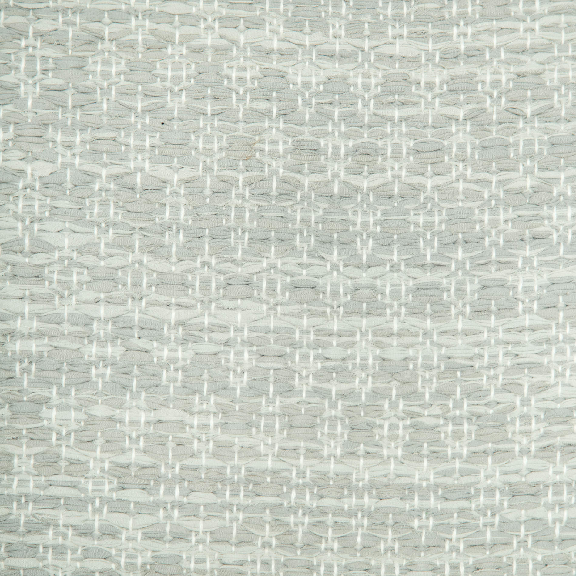<p>Ukrainian Flower, grey mix 124, 127, 150 on the white yarn</p>