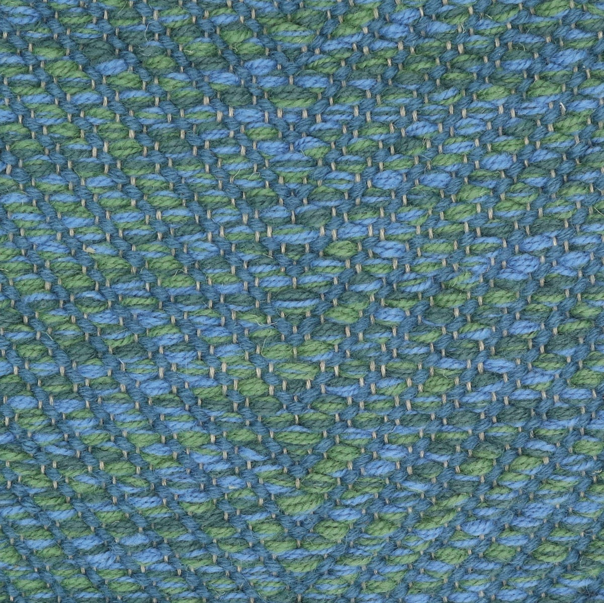 <p>Dual Vertical Herringbone, main blue-green mix CH3424, 4006, 5017, inside blue 5023 on the natural yarn</p>