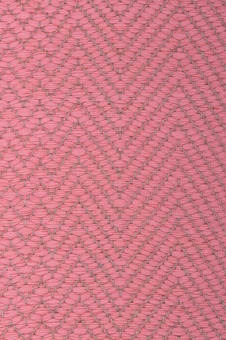 <p>Very wide Herringbone in one end and then gradually diminishing until Zig zag in other end, pink  379 on the natural yarn</p>